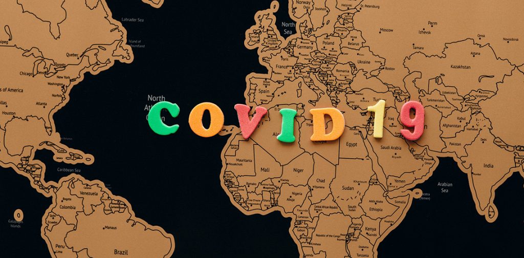 A map of Europe and the "Covid 19" sign on it