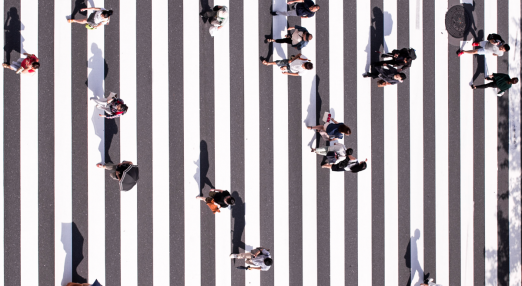 People walking on a crossing.