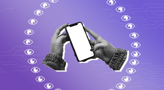 A pair of hands using a smartphone, while being watched by multiple eyes, referencing surveillance.