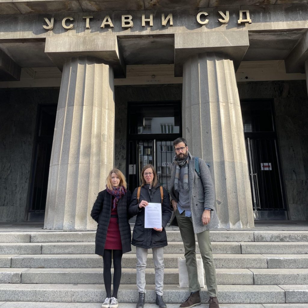 Danilo Ćurčic, Francesca Feruglio and Imogen Richmond-Bishop, the three authors of the piece on the steps of the Serbian Constitutional Court.
