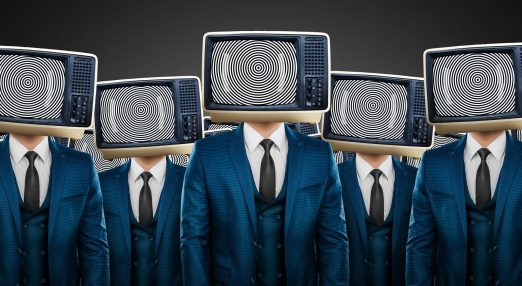 A group of peple with TV screens on their faces